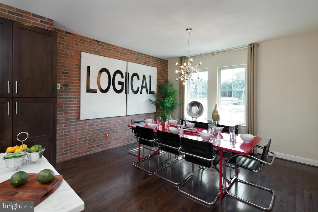42262 Rhett Drive Ashburn, VA 20148 - Photo 9 of 30 a living room with furniture and a window