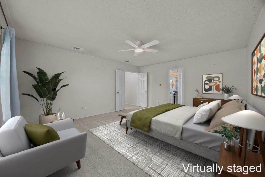 1000 West Noton Street Pflugerville, TX 78660 - Photo 23 of 35 a living room with furniture and a potted plant