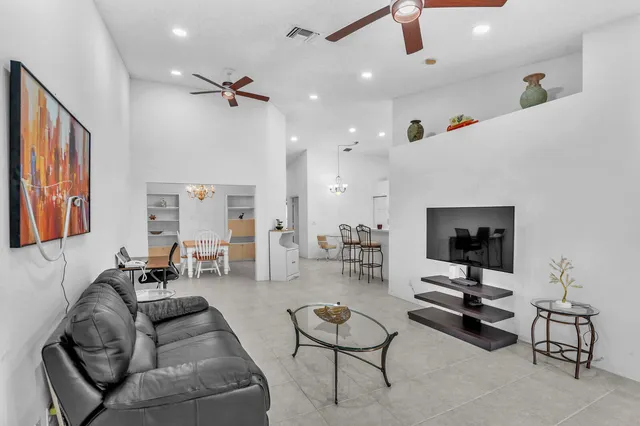 a bathroom with a shower and a sink