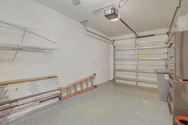 a dining room with furniture window and wooden floor