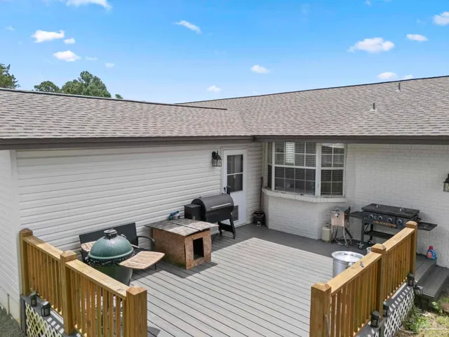 a backyard of a house with seating space