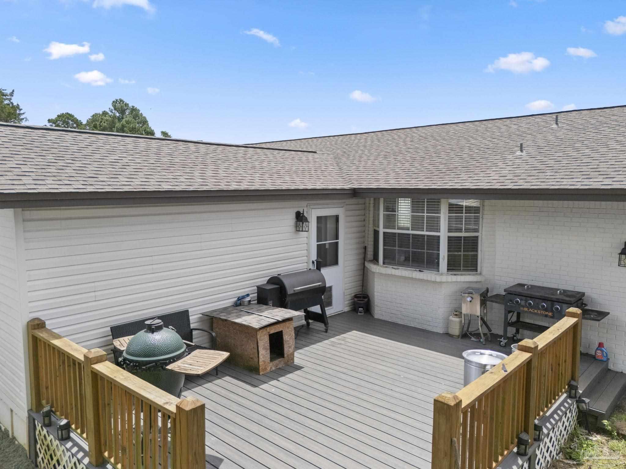 2065 Brownsdale Loop Road Jay, FL 32565 - Photo 24 of 25 a backyard of a house with seating space