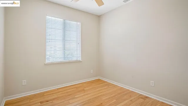 a view of a hallway with closet area