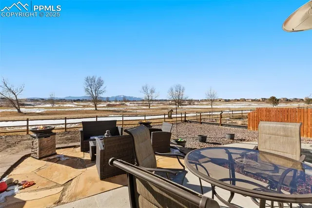 a view of a terrace with seating area