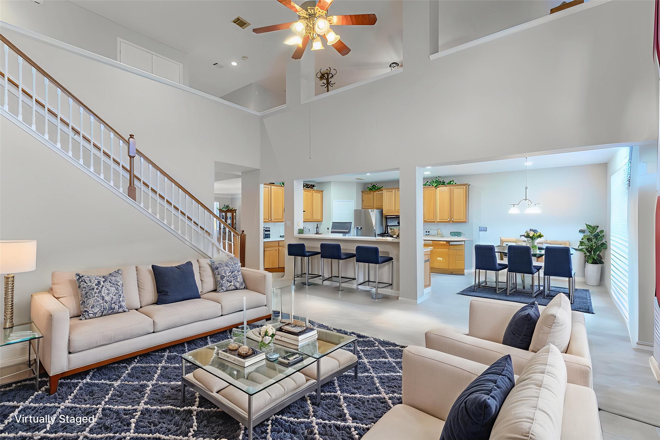 1205 Cambridge Court Seabrook, TX 77586 - Photo 15 of 47 a living room with furniture a chandelier and a rug