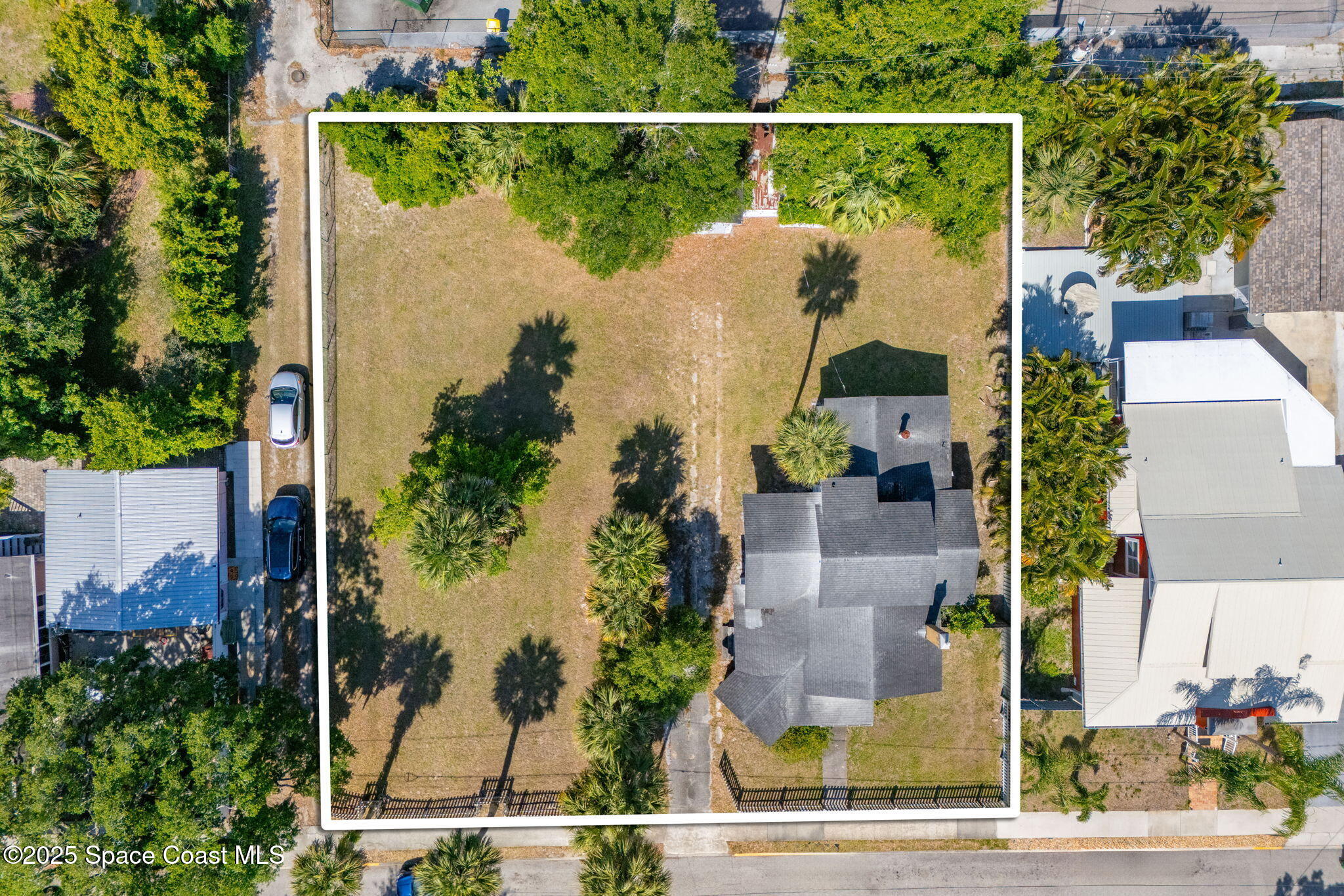 2106 Vernon Place Melbourne, FL 32901 - Photo 8 of 33 an aerial view of houses and roads