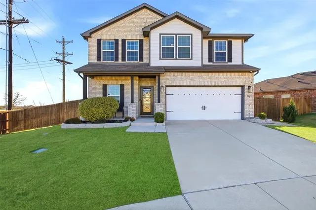 a house view with a garden space