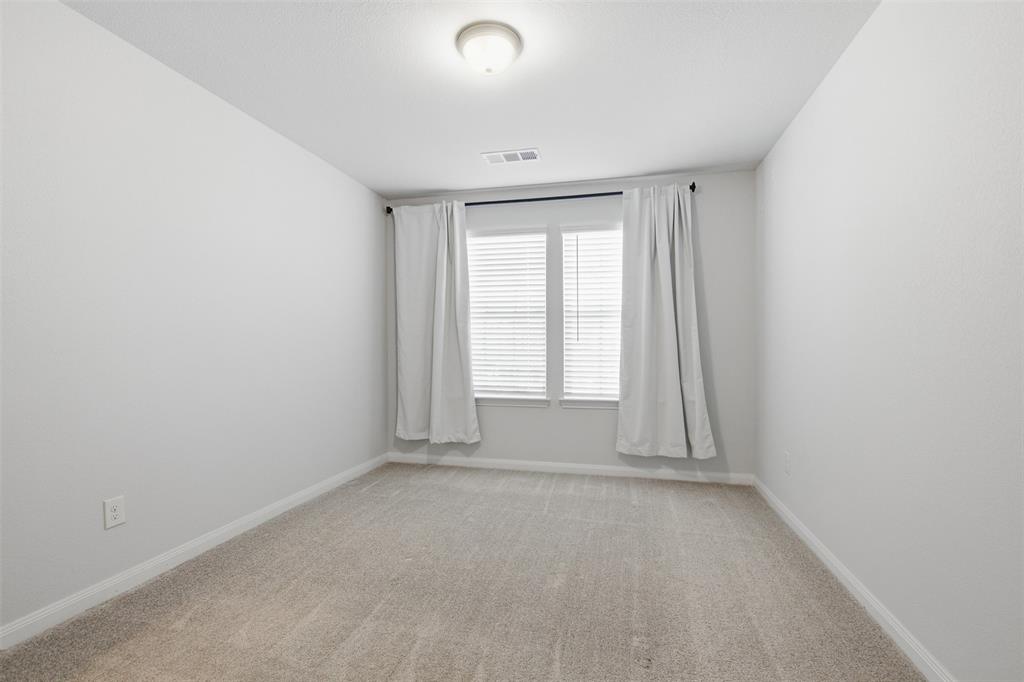 2049 Hartley Drive Forney, TX 75126 - Photo 28 of 36 an empty room with a window