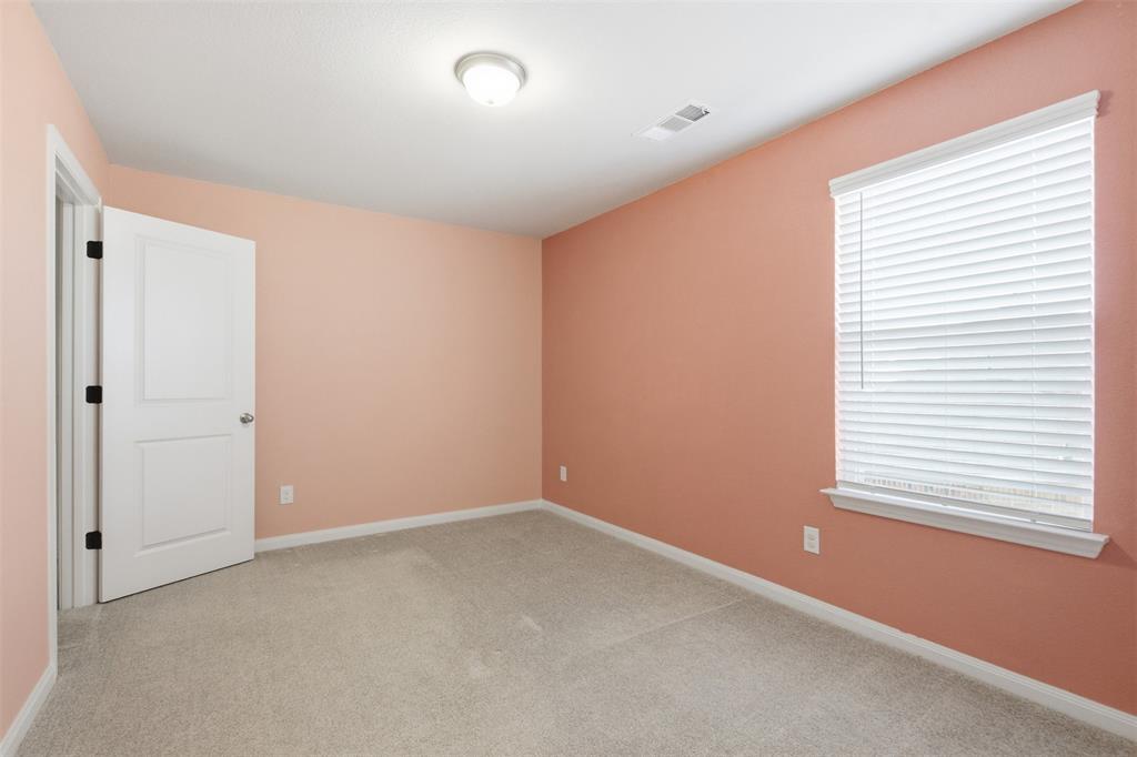 2049 Hartley Drive Forney, TX 75126 - Photo 30 of 36 an empty room with a window