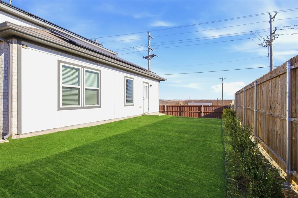 2049 Hartley Drive Forney, TX 75126 - Photo 33 of 36 a house view with a garden space