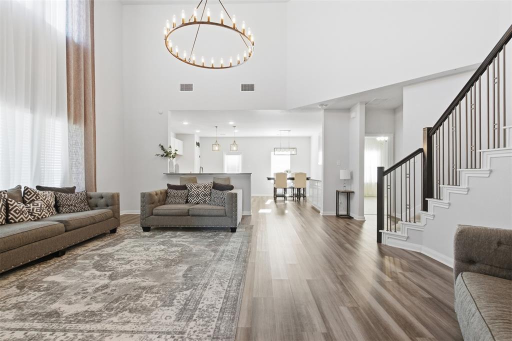 2049 Hartley Drive Forney, TX 75126 - Photo 6 of 36 a living room with furniture and a flat screen tv