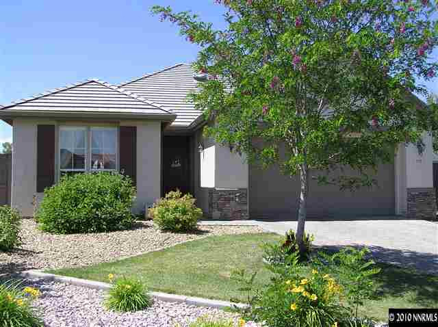 570 Seattle Slew Court Reno, NV 89521 - Photo 1 of 9 a front view of house with yard and trees