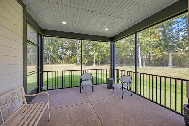 a bathroom with a double vanity sink mirror and shower