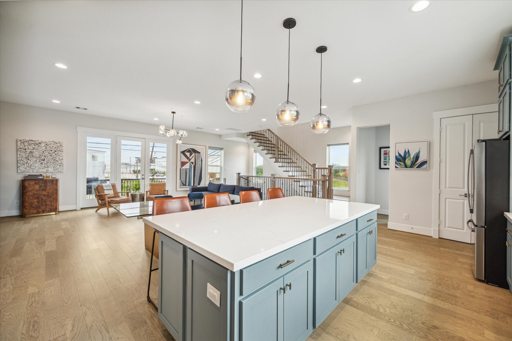 2803 Hicks Street Houston, TX 77007 - Photo 10 of 16 a large kitchen with kitchen island a large island in it