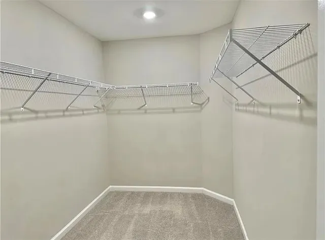 a view of a room with racks on the wall