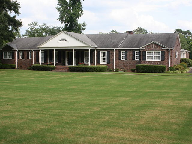 21 Horseleg Creek Road Southwest Rome, GA 30165 - Photo 1 of 1 a front view of a house with a garden