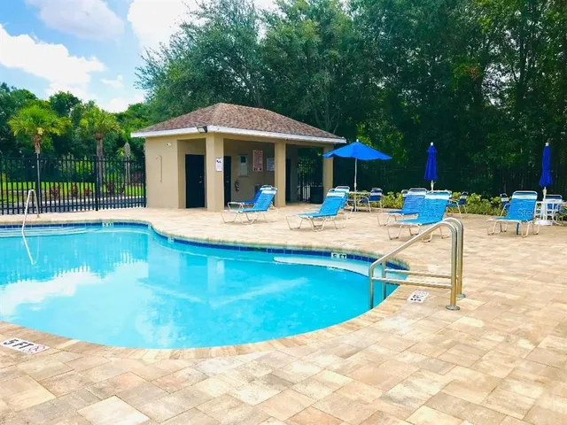 a view of a house with swimming pool