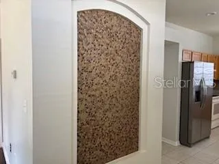 a bathroom with a shower and a sink