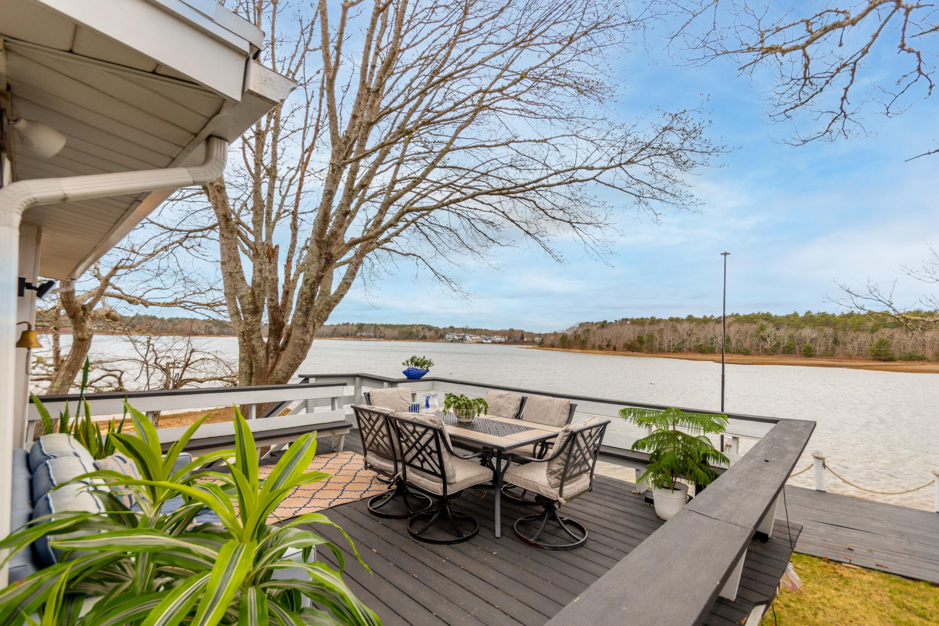 10 Sunset Avenue Onset, MA 02558 - Photo 2 of 41 Enjoy the deck on the water