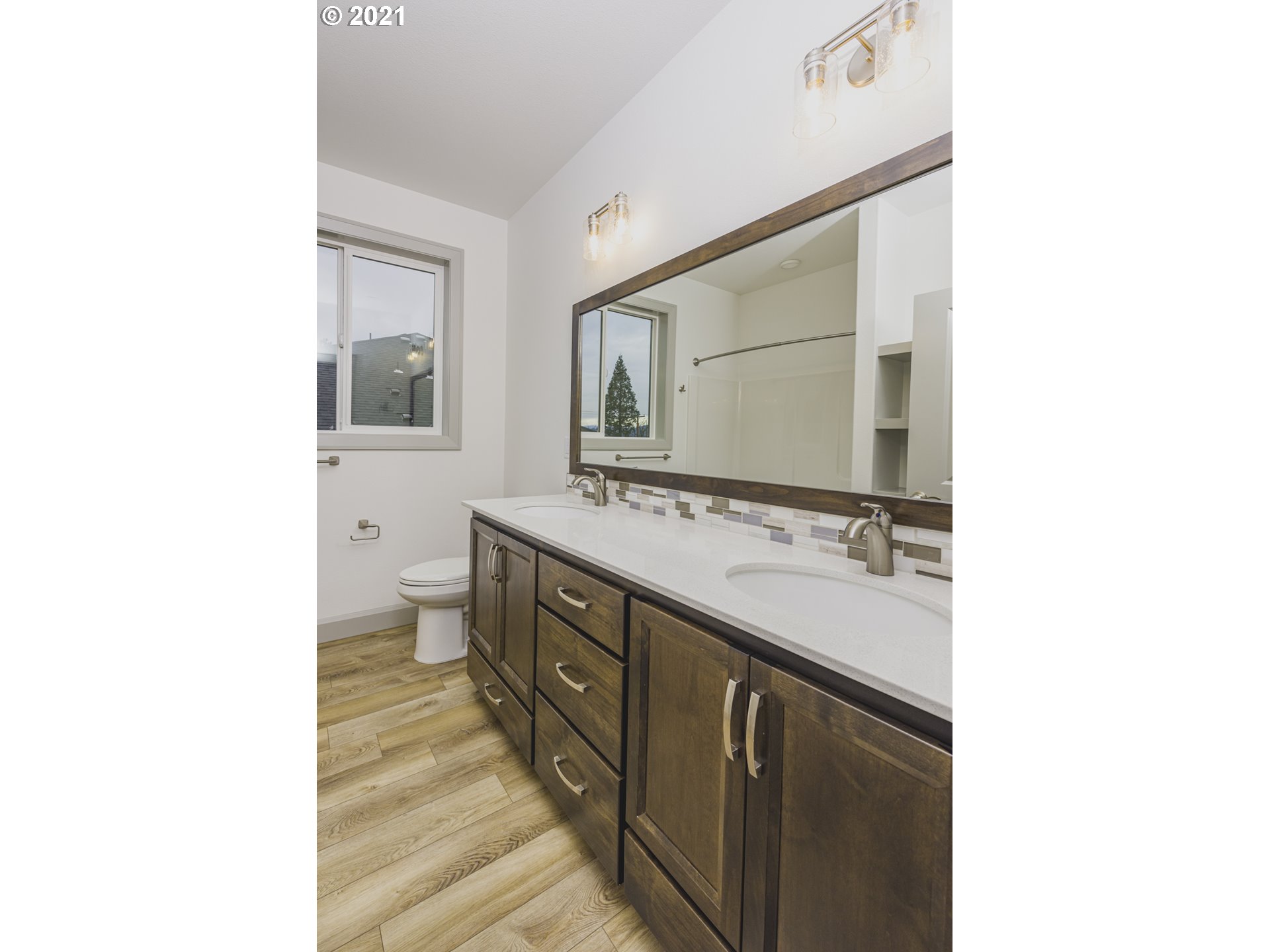 2325 South Royal Court Ridgefield, WA 98642 - Photo 22 of 30 a bathroom with a sink and a mirror