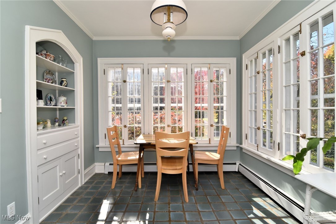 2887 Kingsley Road Shaker Heights, OH 44122 - Photo 11 of 40 Two walls of windows make the Morning Room a cheerful place to eat or work.