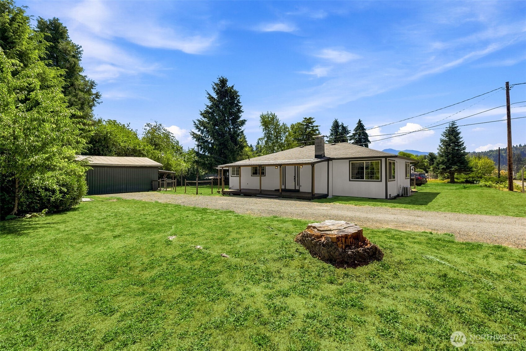 158 Gharet Road Randle, WA 98377 - Photo 20 of 25 a front view of a house with a garden