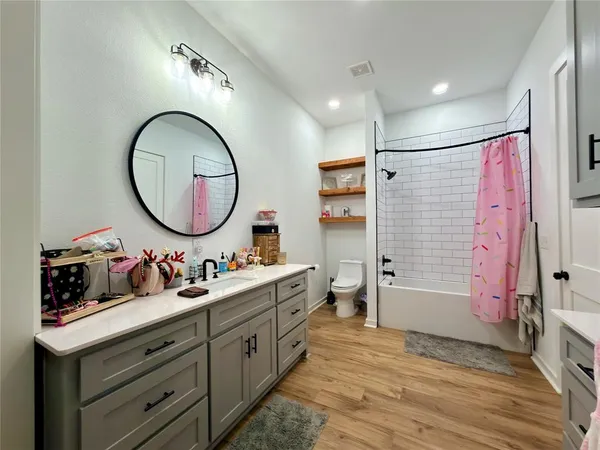 a bathroom with a double vanity sink mirror double vanity and a mirror