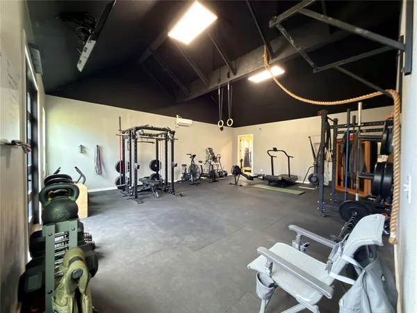 a view of a room with gym equipment