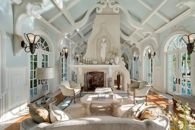 a view of a room with gym equipment and floor to ceiling window