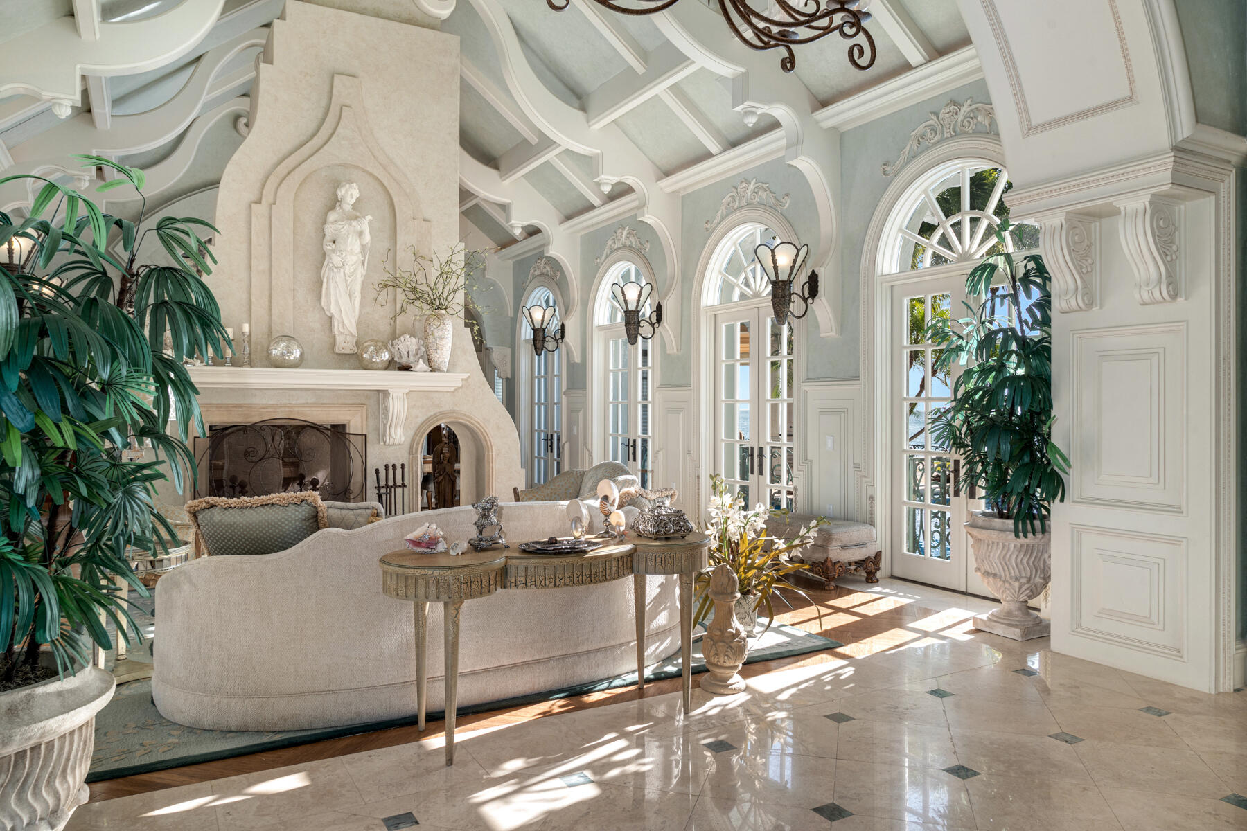 19 Sunset Key Drive Key West, FL 33040 - Photo 14 of 98 a living room with fireplace furniture and a potted plant