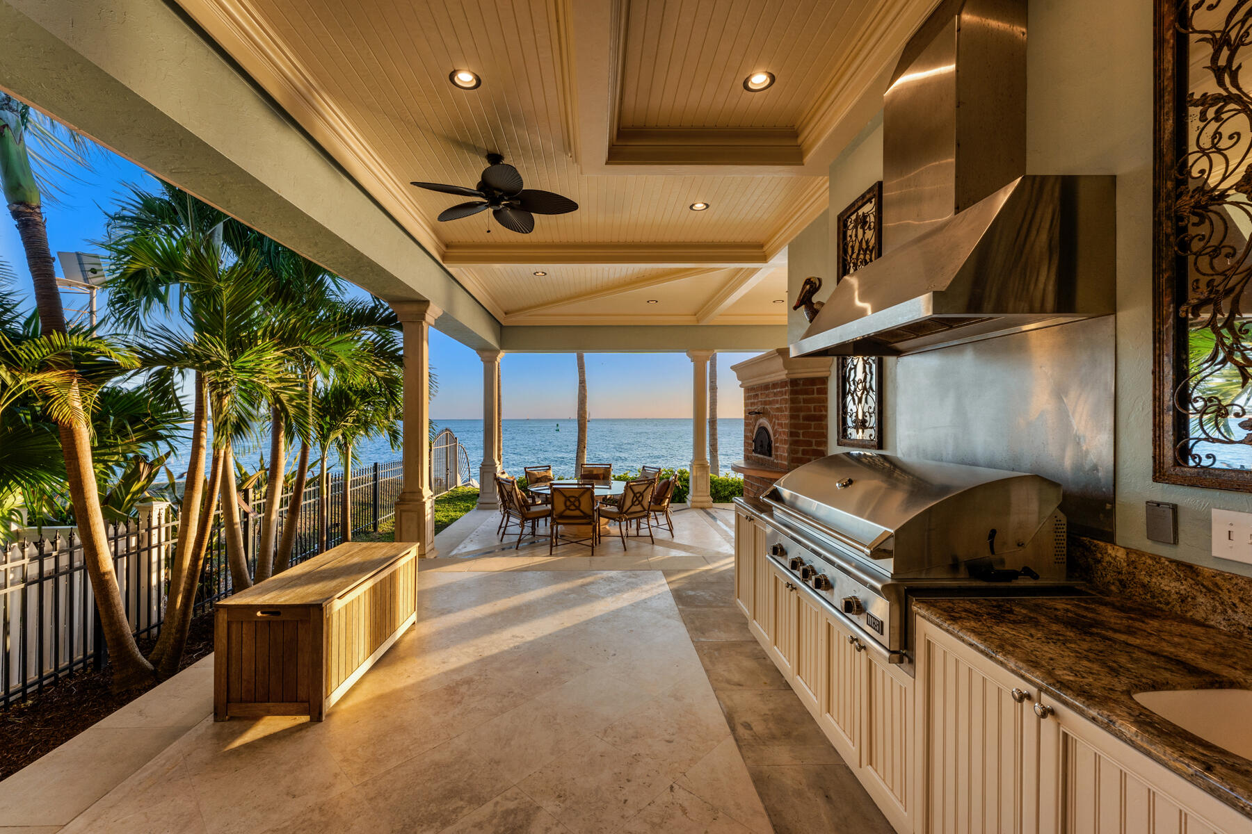 19 Sunset Key Drive Key West, FL 33040 - Photo 24 of 98 a open kitchen with stainless steel appliances granite countertop a stove and a sink with cabinets