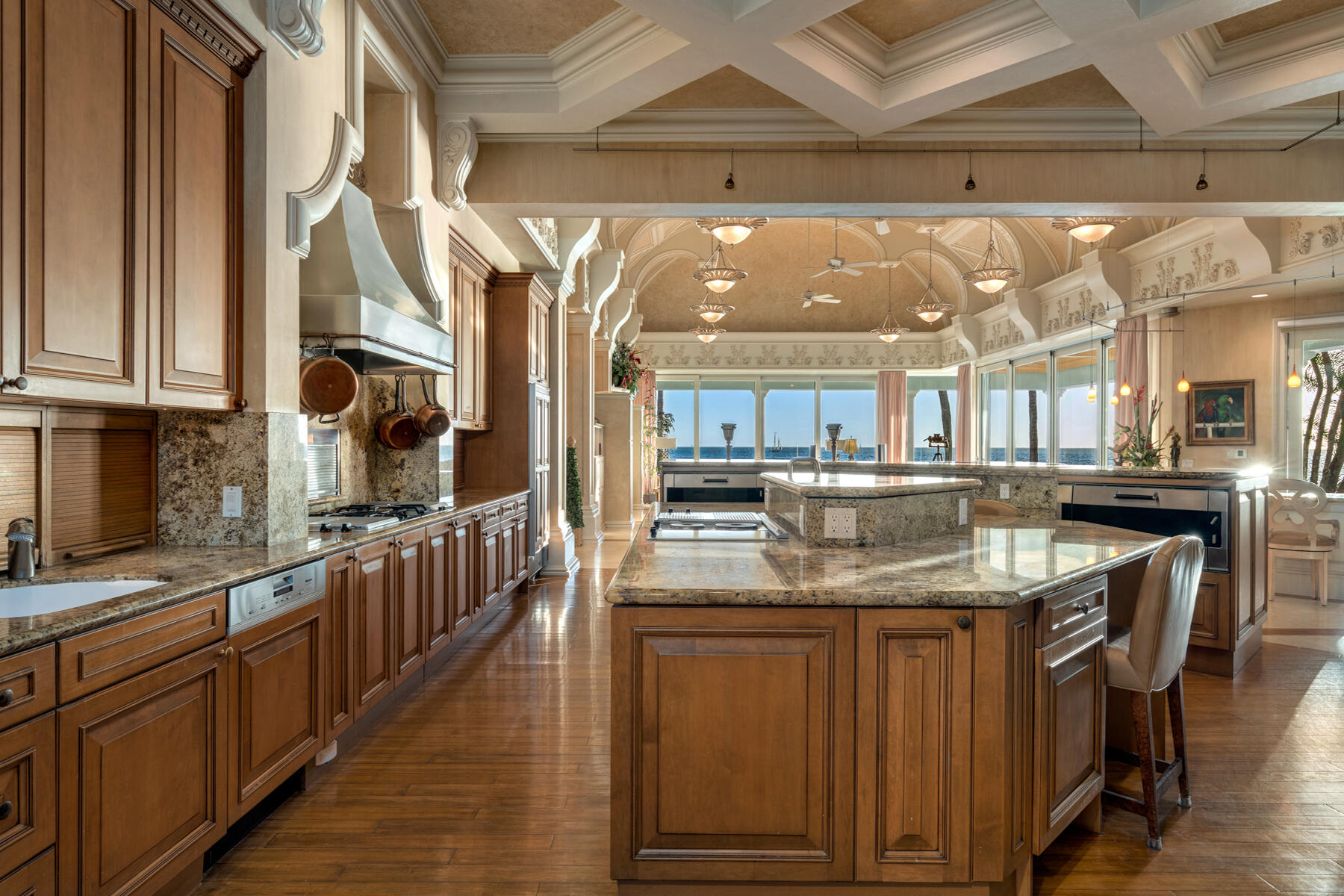 19 Sunset Key Drive Key West, FL 33040 - Photo 32 of 98 a kitchen with stainless steel appliances granite countertop a sink and cabinets