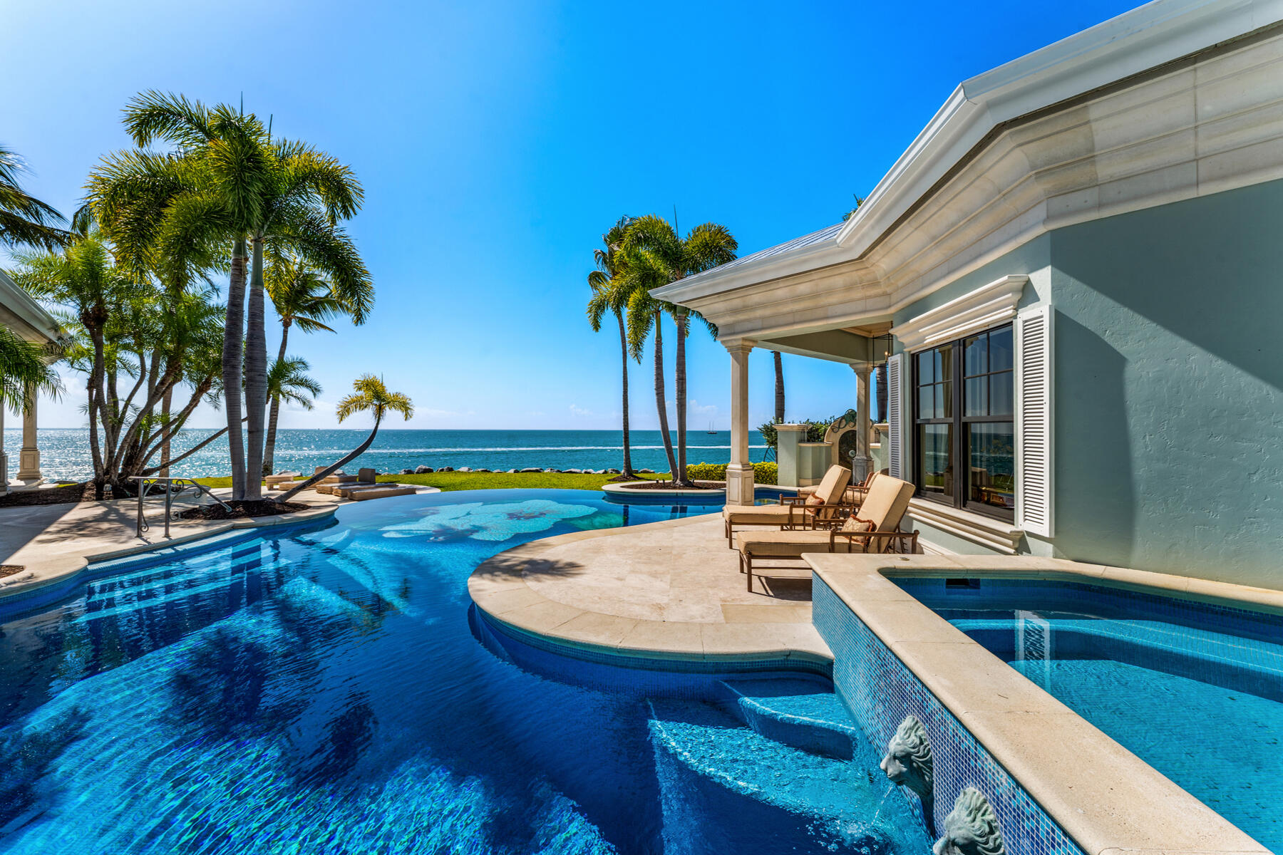 19 Sunset Key Drive Key West, FL 33040 - Photo 62 of 98 a view of a house with backyard and swimming pool