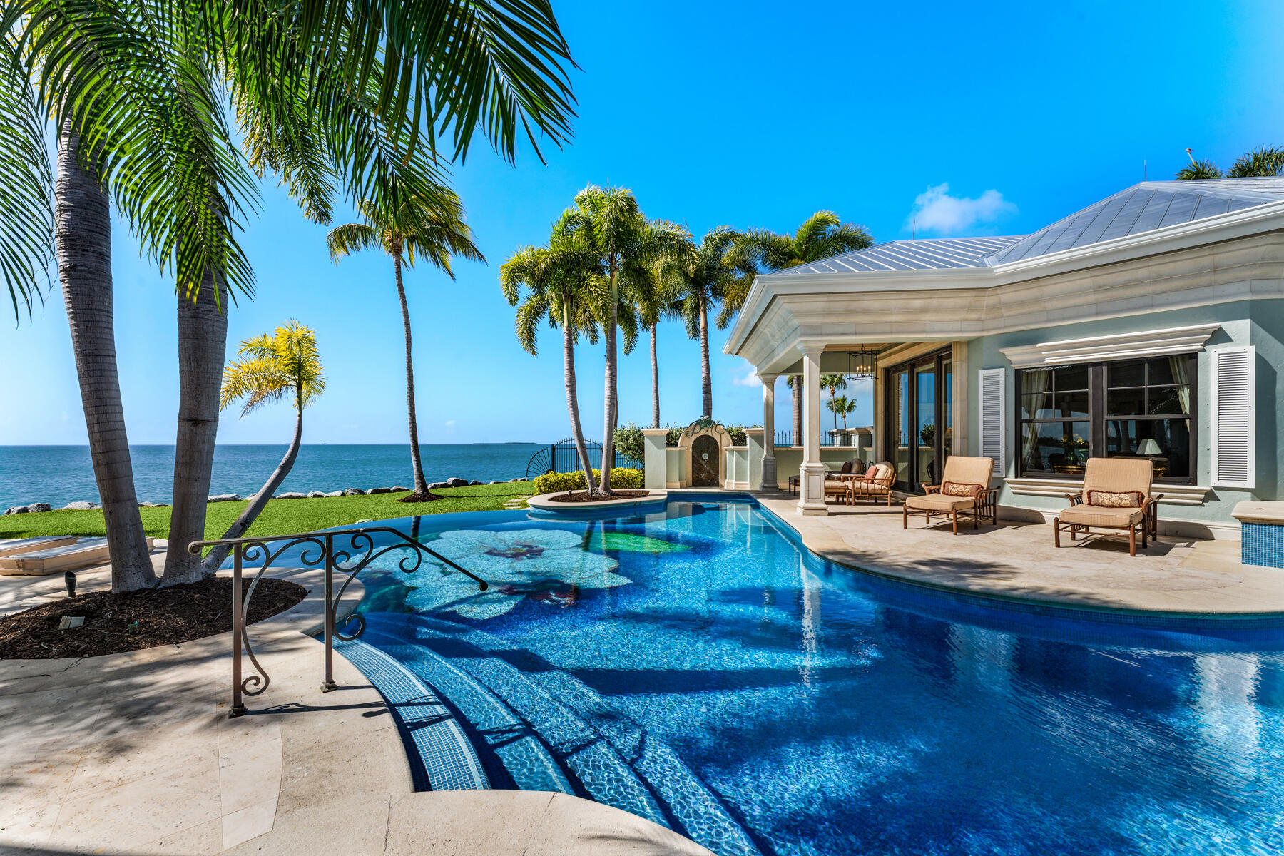 19 Sunset Key Drive Key West, FL 33040 - Photo 74 of 98 a view of a backyard with swimming pool and sitting area