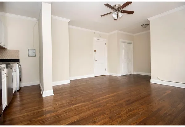 a view of a livingroom with wooden floor