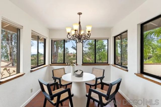 a view of a room with a large window