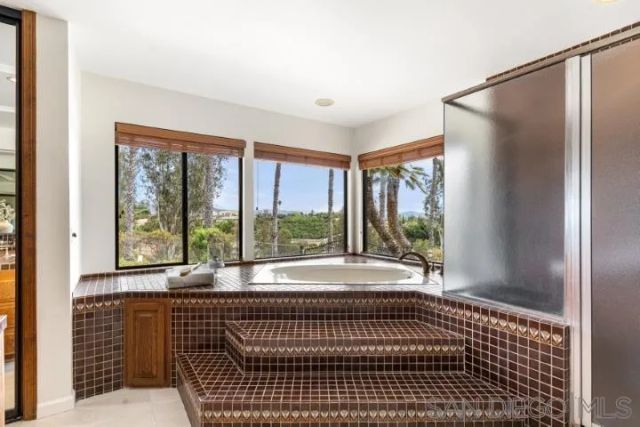 a view of balcony with furniture