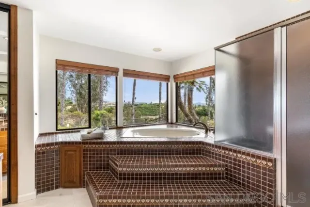 a view of balcony with furniture