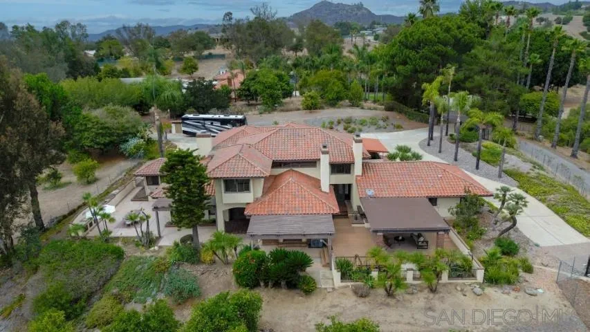 3253 Yucca Terrace Fallbrook, CA 92028 - Photo 61 of 62 an aerial view of a house with yard and outdoor seating
