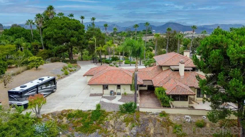 3253 Yucca Terrace Fallbrook, CA 92028 - Photo 62 of 62 an aerial view of a house with garden space and street view