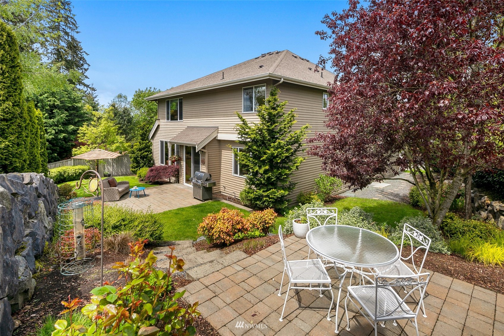 4202 221st Place Southeast Bothell, WA 98021 - Photo 25 of 28 a view of an house with backyard space and garden