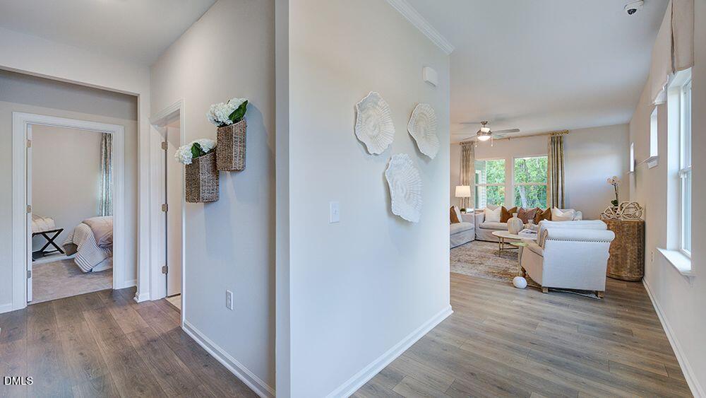 258 Blue Butterfly Drive Angier, NC 27501 - Photo 8 of 42 a view of a living room and dining room