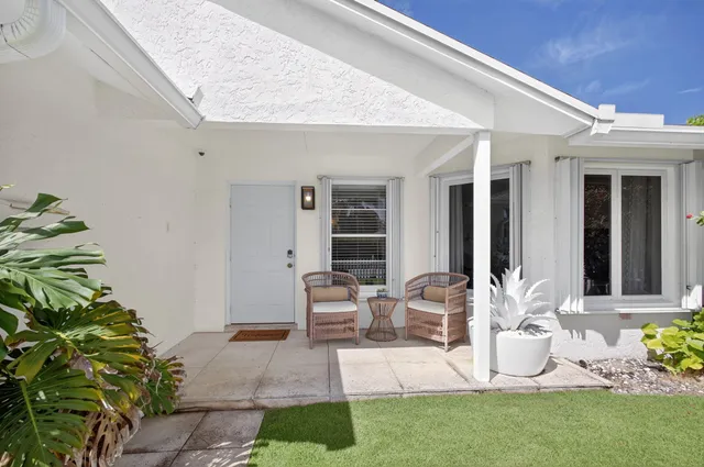 a view of a swimming pool and an outdoor space
