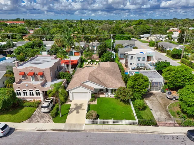 a view of a tall building with a tree