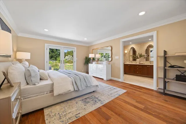 a view of a chair and tables in the patio of a house