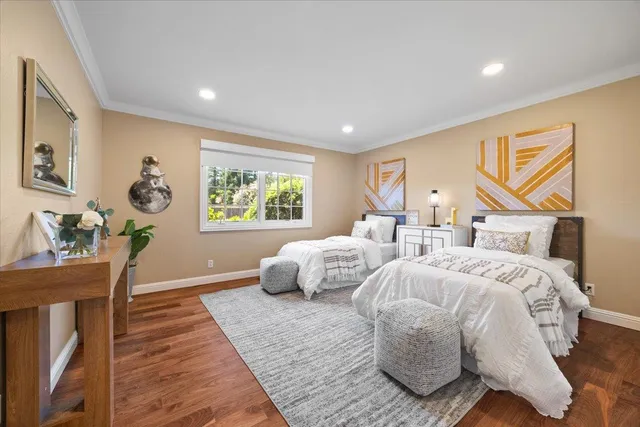 a view of a backyard with sitting area and garden