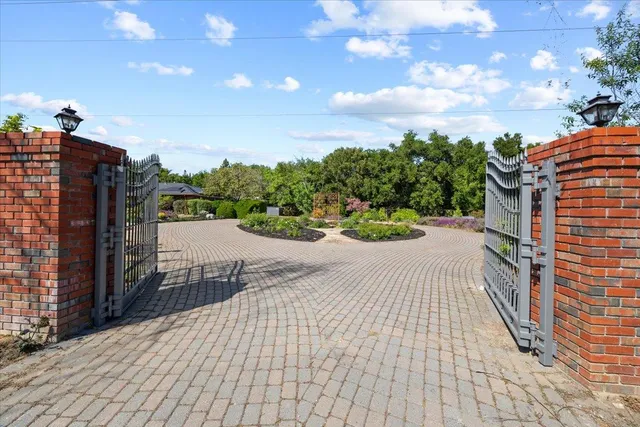 a view of a lake with houses in the back