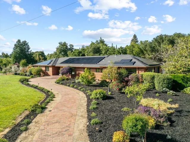 a view of a swimming pool with a sitting area