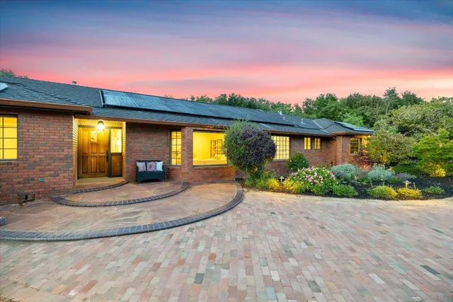 a stove top oven sitting inside of a kitchen