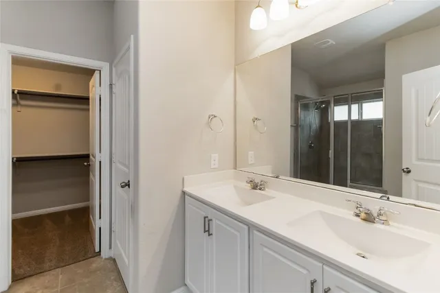 a backyard of a house with barbeque oven